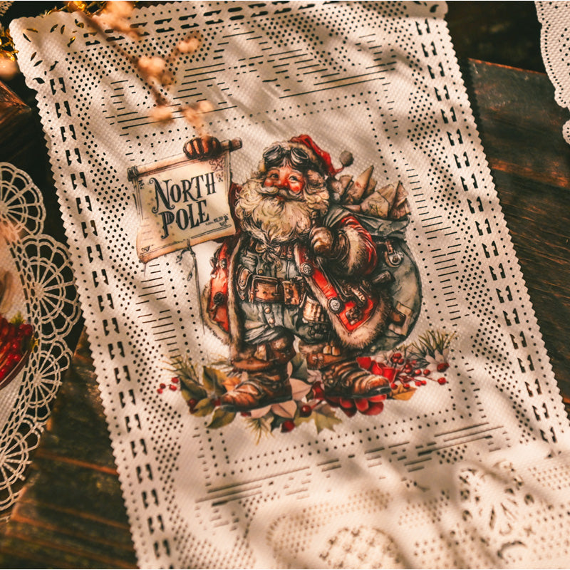 Vintage style Christmas rub-on stickers on paper – Santa, trees, gifts, and holiday decorations